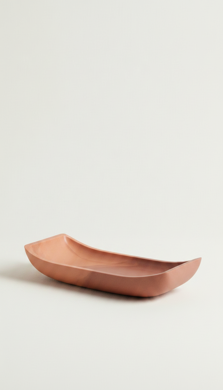 Curved resin decorative tray, styled in a home setting